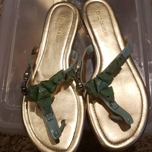Light green and gold jeweled stone thong sandals.